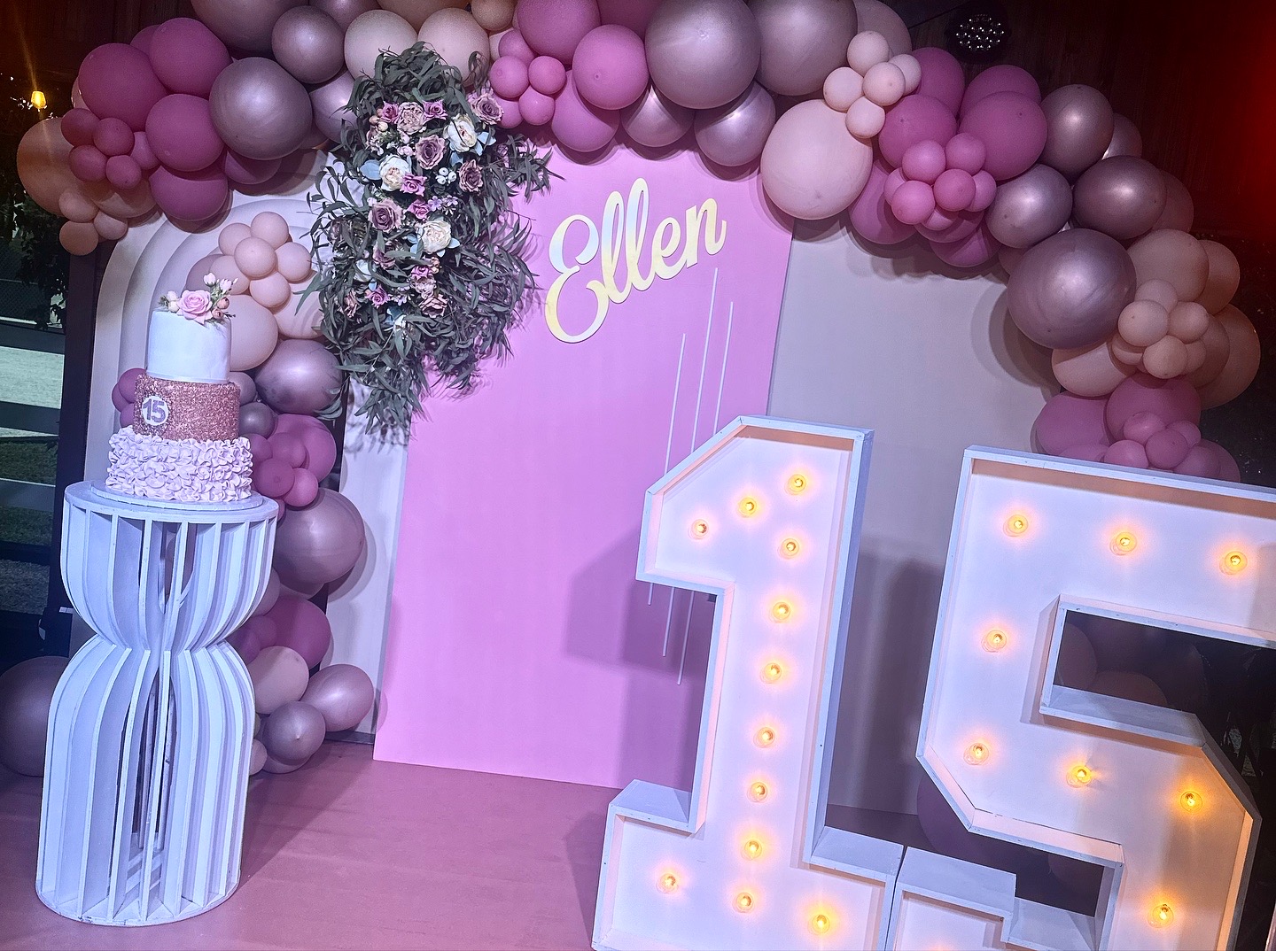 Pink and rose gold quinceañera balloon arch with marquee 15 by Party Pop Balloons Miami